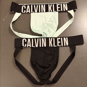 New Calvin Klein Men's Jockstrap Briefs - Black and Mint. Microfiber